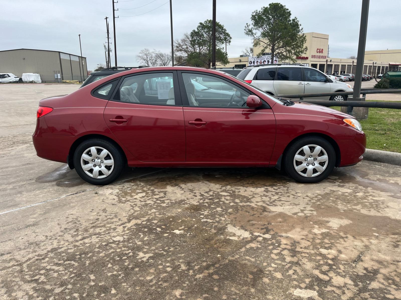 2008 red /TAN Hyundai Elantra GLS (KMHDU46D78U) with an 2.0L L4 DOHC 16V engine, Manual transmission, located at 14700 Tomball Parkway 249, Houston, TX, 77086, (281) 444-2200, 29.928619, -95.504074 - Photo #7